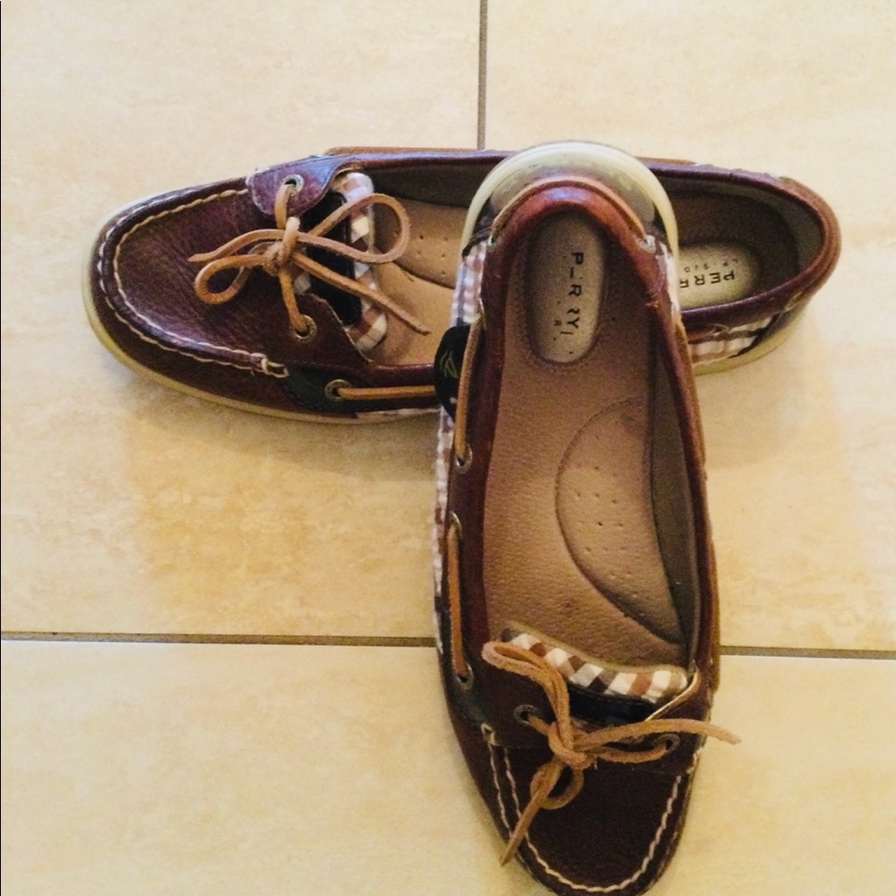 Sperry top slider boat shoes.